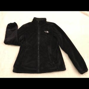 The Northface black zip up jacket.